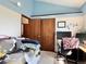 Comfortable bedroom with a built-in workstation and ample closet space at 8296 S Reed St, Littleton, CO 80128