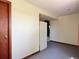 Clean and empty room features fresh walls, trim, and lighting for an easy move-in at 8296 S Reed St, Littleton, CO 80128