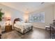 Bedroom featuring a queen-sized bed and natural light at 4396 S Quail Way, Littleton, CO 80127