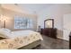 Bedroom featuring a queen-sized bed and views at 4396 S Quail Way, Littleton, CO 80127