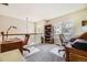 Loft with wood desks, natural light, and neutral carpet on the upper level at 4396 S Quail Way, Littleton, CO 80127