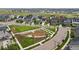 Desirable neighborhood featuring a large common green space with play area at 6072 Chester St, Denver, CO 80238