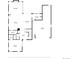 Layout of the entry level featuring the living room, kitchen, bedroom, and garage at 6072 Chester St, Denver, CO 80238
