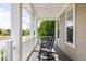 Welcoming front porch with rocking chairs, perfect for relaxing and enjoying the neighborhood views at 6072 Chester St, Denver, CO 80238
