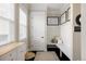 Inviting mud room with built-in bench and storage, blending functionality with classic design at 6072 Chester St, Denver, CO 80238