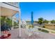 Outdoor patio featuring outdoor seating, grill, and views of a lake at 3337 W 113Th Ave, Westminster, CO 80031
