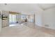 Spacious basement with an entertainment area, wet bar, and sliding glass doors to the exterior at 3337 W 113Th Ave, Westminster, CO 80031