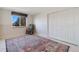 Bedroom features ample space and a closet for easy storage solutions at 3337 W 113Th Ave, Westminster, CO 80031