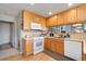 Well-lit kitchen with wood cabinets, modern appliances, and open layout at 3337 W 113Th Ave, Westminster, CO 80031