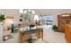 Bright living room with vaulted ceilings, large windows, and a view to the exterior at 3337 W 113Th Ave, Westminster, CO 80031
