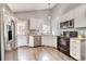 Bright kitchen with stainless steel appliances, granite countertops, and modern cabinetry at 8483 Sandreed Cir, Parker, CO 80134