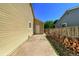 A functional side yard offers a paved area for storage, and easy access to the backyard at 8483 Sandreed Cir, Parker, CO 80134