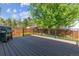 Spacious composite deck with black metal railing overlooking a backyard perfect for outdoor entertaining at 7312 S Moore Ct, Littleton, CO 80127