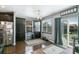Eat-in kitchen with built-in cabinets and stainless steel appliances at 9919 Memphis St, Commerce City, CO 80022