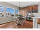 The kitchen features stainless steel appliances, granite countertops, and lots of natural light at 26531 E Calhoun Pl, Aurora, CO 80016