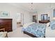 Tranquil bedroom with a view of the en suite bathroom at 26531 E Calhoun Pl, Aurora, CO 80016