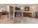 Cozy bedroom featuring ceramic tile floors and wood cabinets at 28098 Green Valley Ln, Conifer, CO 80433
