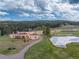 Expansive land with custom home and pond surrounded by forest at 28098 Green Valley Ln, Conifer, CO 80433