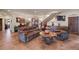 Cozy living room featuring tile floors, comfortable seating, and decorative accents at 28098 Green Valley Ln, Conifer, CO 80433