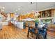 Spacious kitchen with a large island, wood cabinets, and modern appliances at 9041 Eastridge Rd, Golden, CO 80403