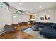 Another angle of the living room with a partial view of the bar at 9041 Eastridge Rd, Golden, CO 80403
