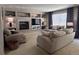 Cozy living room with fireplace, built-in shelves, comfortable seating and stylish decor at 5724 S Rome St, Aurora, CO 80015