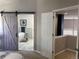 View of the main bathroom showcasing the modern soaking tub and marble tile at 5724 S Rome St, Aurora, CO 80015