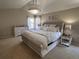 This main bedroom features stylish decor, a large bed, and a comfortable, inviting atmosphere at 5724 S Rome St, Aurora, CO 80015