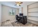 This office features carpet and built-in shelving for storage at 9630 W 104Th Ave, Broomfield, CO 80021