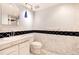 Clean bathroom with marble tile and updated vanity at 1200 N Humboldt St # 1103, Denver, CO 80218