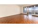 Bright bedroom with parquet flooring and balcony access and city views at 1200 N Humboldt St # 1103, Denver, CO 80218