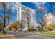 Highrise building exterior with trees and city street view at 1200 N Humboldt St # 1103, Denver, CO 80218