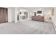 Expansive basement area with carpeting, a seating area, and a bar for entertaining at 3281 Vivian Dr, Wheat Ridge, CO 80033