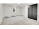 Spacious bedroom with carpet flooring, natural light and a closet for storage at 3281 Vivian Dr, Wheat Ridge, CO 80033