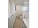 Spacious walk-in closet with custom shelving and drawers for organized storage and easy access to your wardrobe at 3281 Vivian Dr, Wheat Ridge, CO 80033