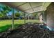 Spacious backyard with a covered patio, perfect for outdoor entertaining and relaxation at 7479 Pierce St, Arvada, CO 80003