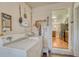 Practical laundry room with washer, dryer, and access to the kitchen at 7479 Pierce St, Arvada, CO 80003