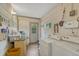 Functional laundry room with white appliances and ample space at 7479 Pierce St, Arvada, CO 80003