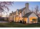 Charming home featuring multiple gables, stone accents, and a covered outdoor area for relaxing at 20 Viking Dr, Cherry Hills Village, CO 80113