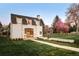 Charming home exterior with lush lawn and beautiful landscaping at 20 Viking Dr, Cherry Hills Village, CO 80113