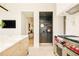 Modern kitchen featuring stainless steel appliances and access to a well stocked bar area at 20 Viking Dr, Cherry Hills Village, CO 80113