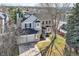A lovely home with a three-car garage and a well-manicured lawn, as seen from an aerial view at 286 Warwick Pl, Castle Pines, CO 80108