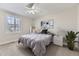 Cozy bedroom with plush carpeting, a ceiling fan, and bright natural light at 286 Warwick Pl, Castle Pines, CO 80108