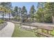 Community playground with play structures, benches, and picnic tables offers outdoor fun for families at 286 Warwick Pl, Castle Pines, CO 80108