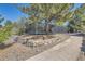 Well-maintained community tennis court surrounded by mature trees and professional fencing at 286 Warwick Pl, Castle Pines, CO 80108