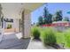 Private backyard patio with stone pillars and string lights at 5601 E Iowa Ave, Denver, CO 80224