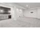 Finished basement with wet bar and ample space for entertainment at 5601 E Iowa Ave, Denver, CO 80224