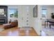 Light and airy entryway with a modern front door at 5601 E Iowa Ave, Denver, CO 80224