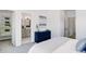 Main bedroom with attached bathroom and walk-in closet at 5601 E Iowa Ave, Denver, CO 80224