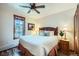 Cozy bedroom with a queen-size bed, wood accents, and natural light at 505 S Main St # 1313, Breckenridge, CO 80424